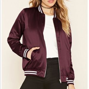 Maroon bomber jacket with white stripes